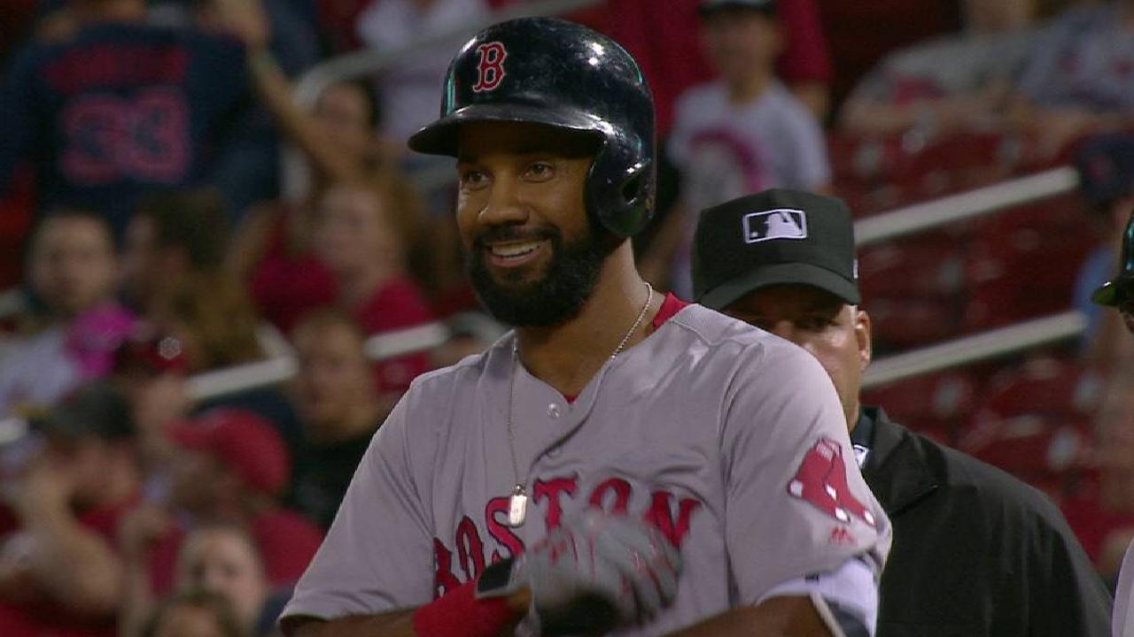 Young's single lifts Sox past Cards in 13