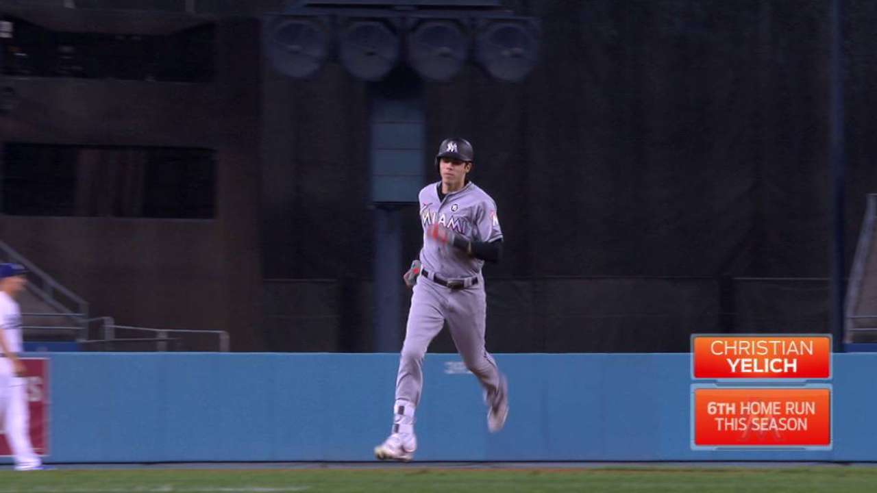 Pair of HRs not enough as Marlins drop opener