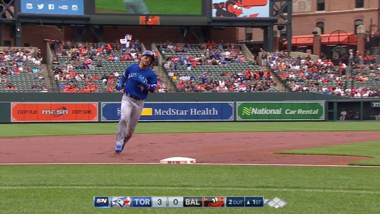 Travis' three-run homer