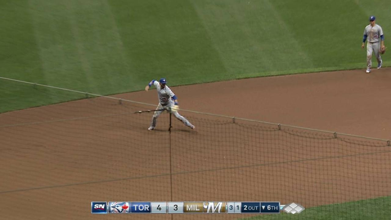 Bautista's diving stop at third