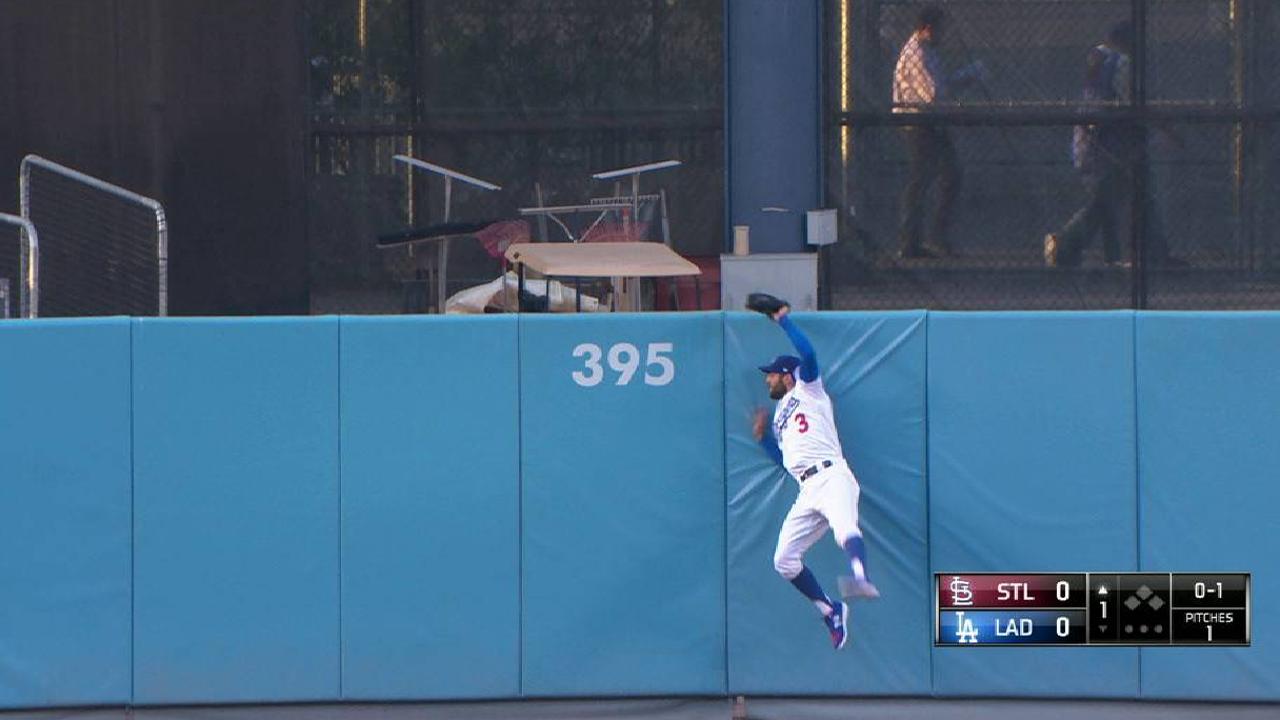 Taylor's leaping grab in center
