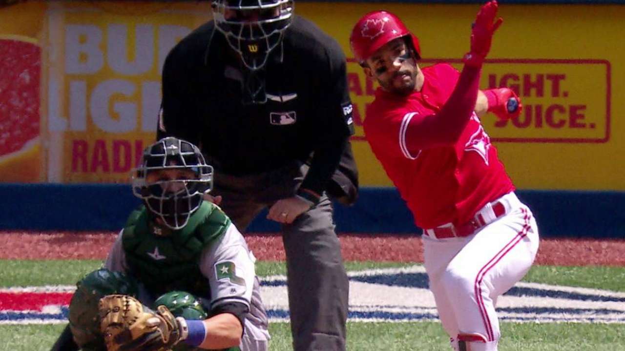 Travis extends hit streak to 12