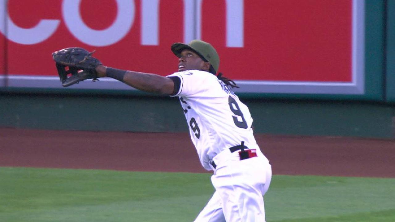 Maybin feels tightness in side after great catch