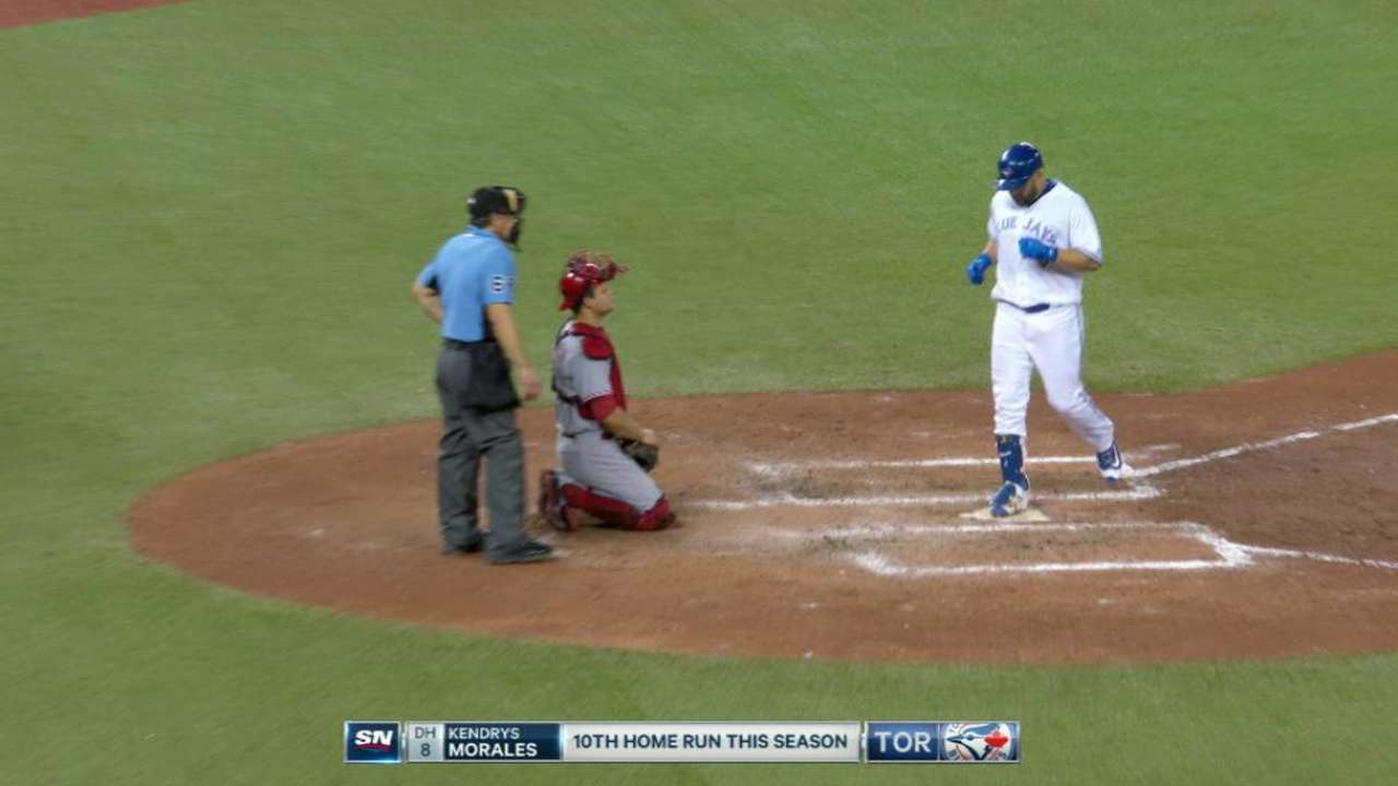 Big home runs power Blue Jays in Happ's return