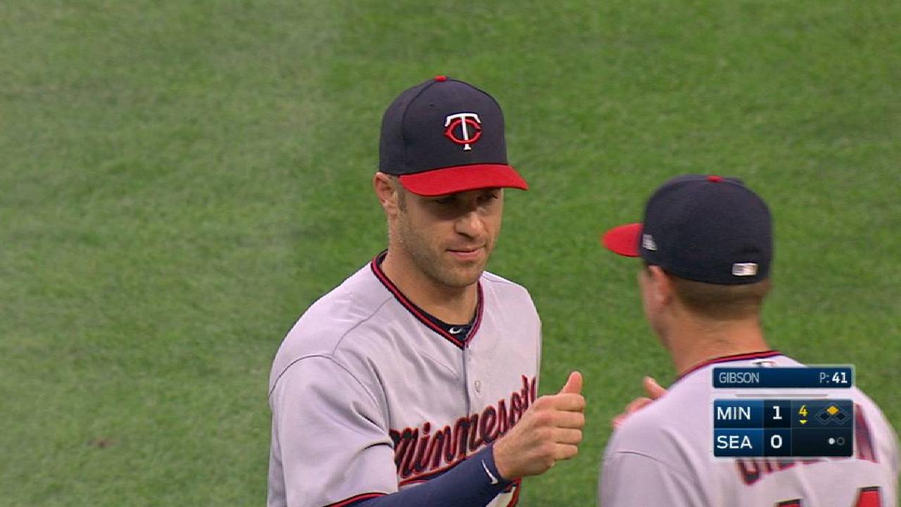 Mauer's diving stop at first