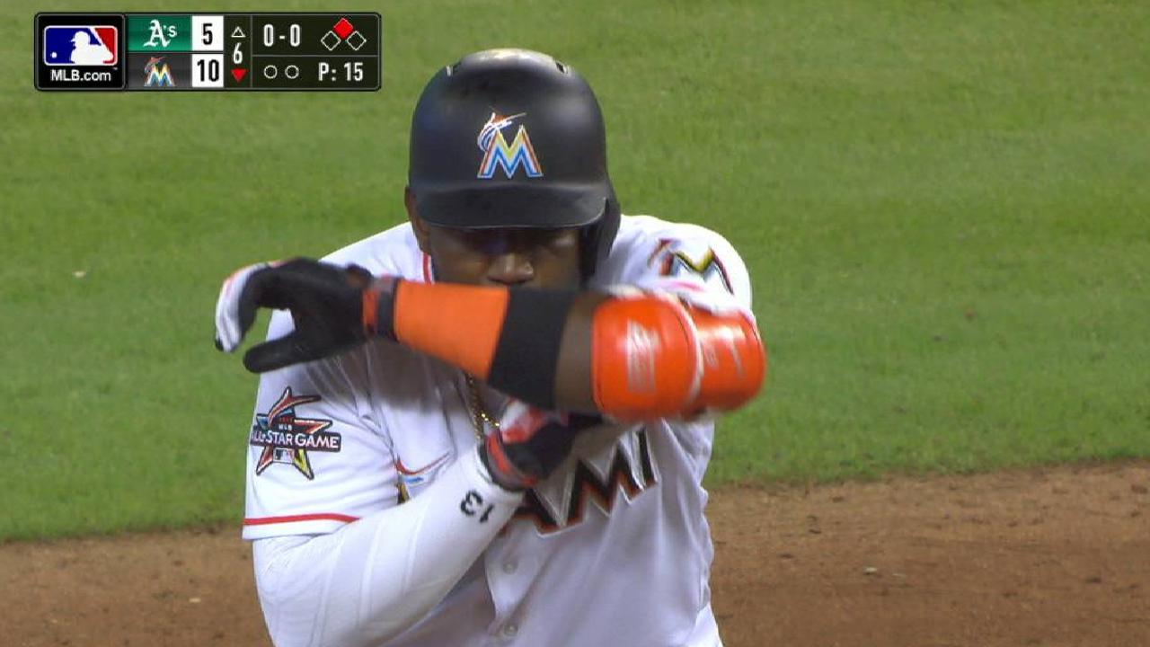 Ozuna drives in 3 to power Marlins past A's