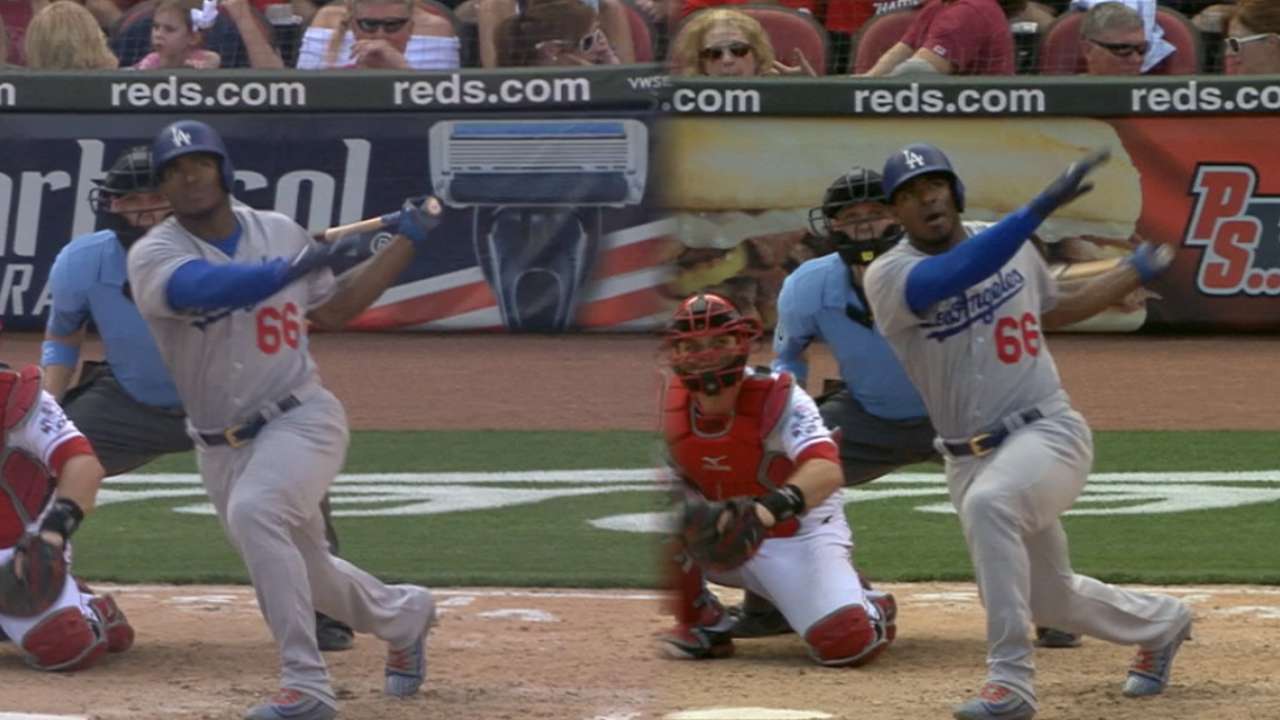 Puig hits 2 of LA's 4 homers in win vs. Reds