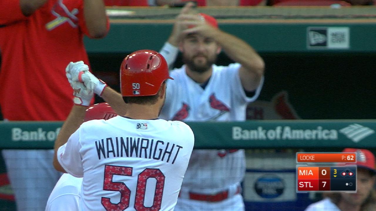 Cards surge early, finish strong to rout Marlins
