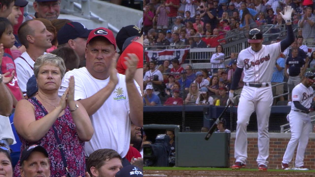 Freeman gets ovation, singles