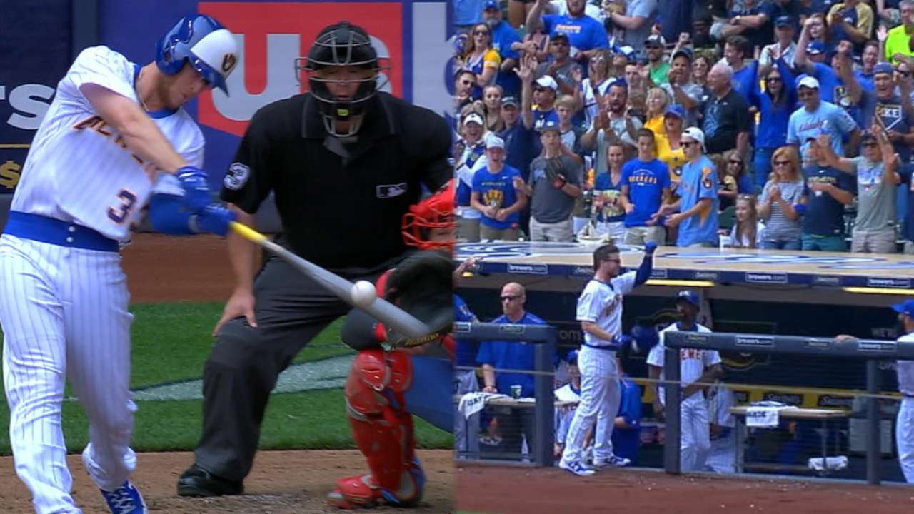 Phillips' first HR spoiled by slam in finale loss