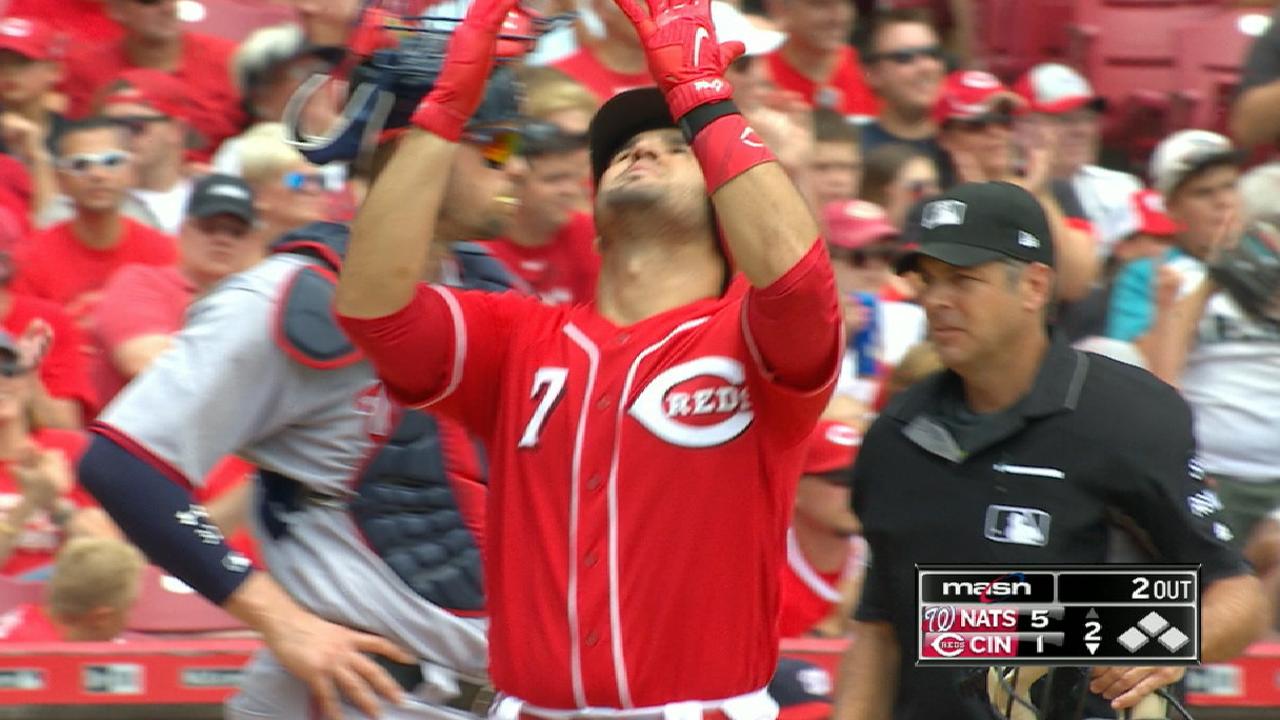 Suarez homers, but tough 1st stings Reds