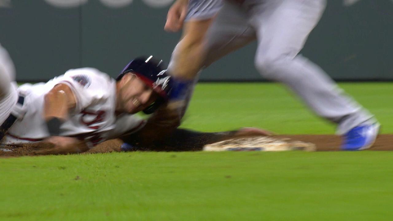 Wood's escape act features pickoff, DP