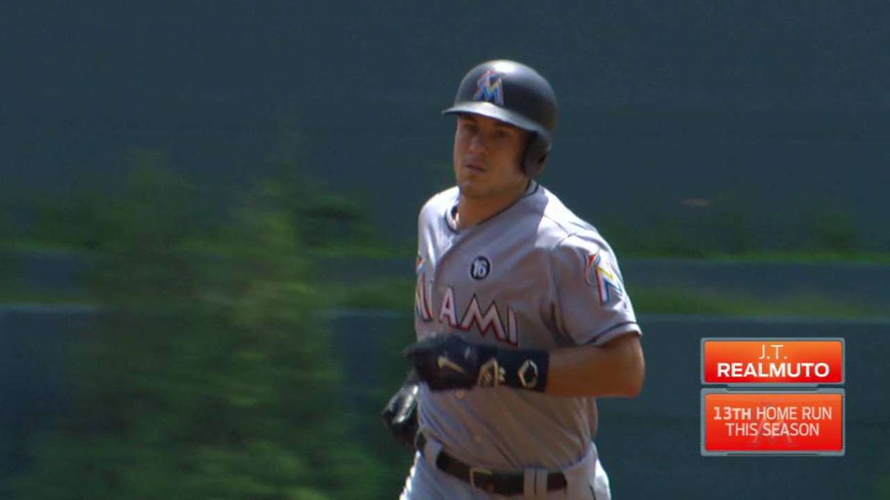 Realmuto homers, impresses in 1st start at 1B