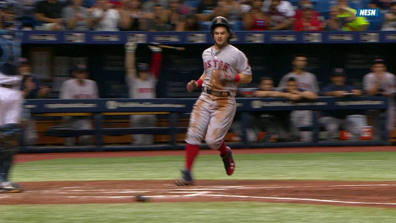 Benintendi scores on an error