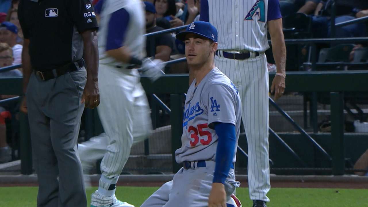 Must C: Bellinger dives for out