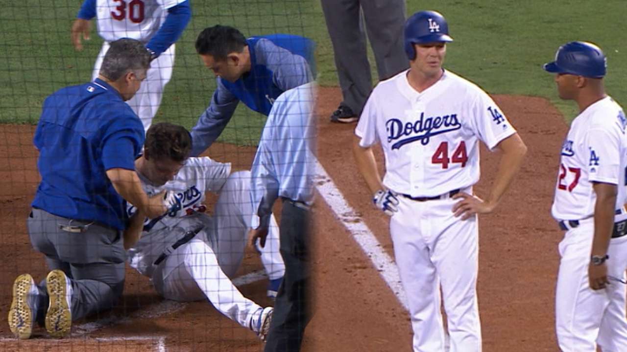 Hill hit in the neck by pitch