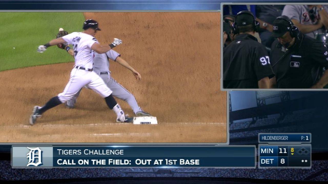 McCann ruled safe at first