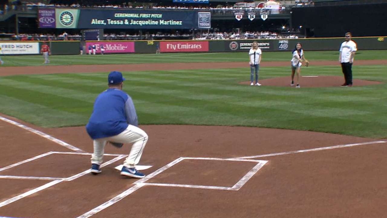Martinez's kids toss first pitch