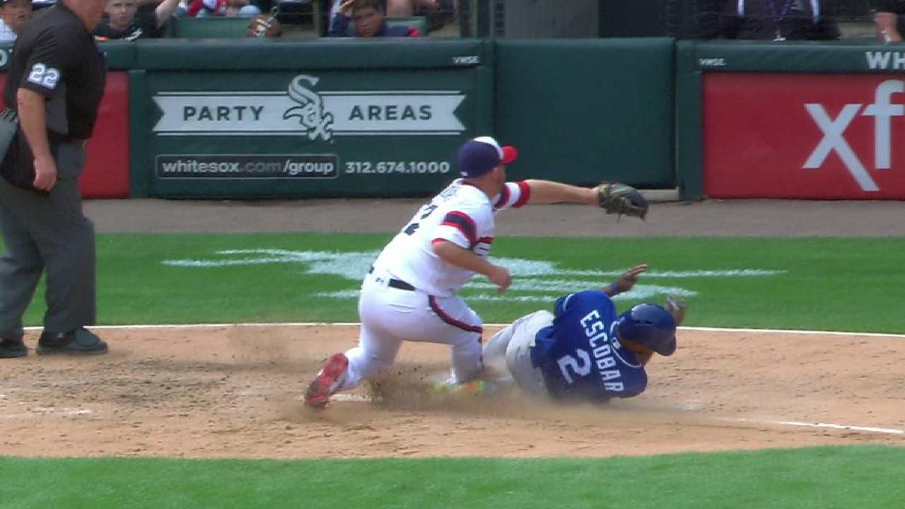 Escobar scores on wild pitch
