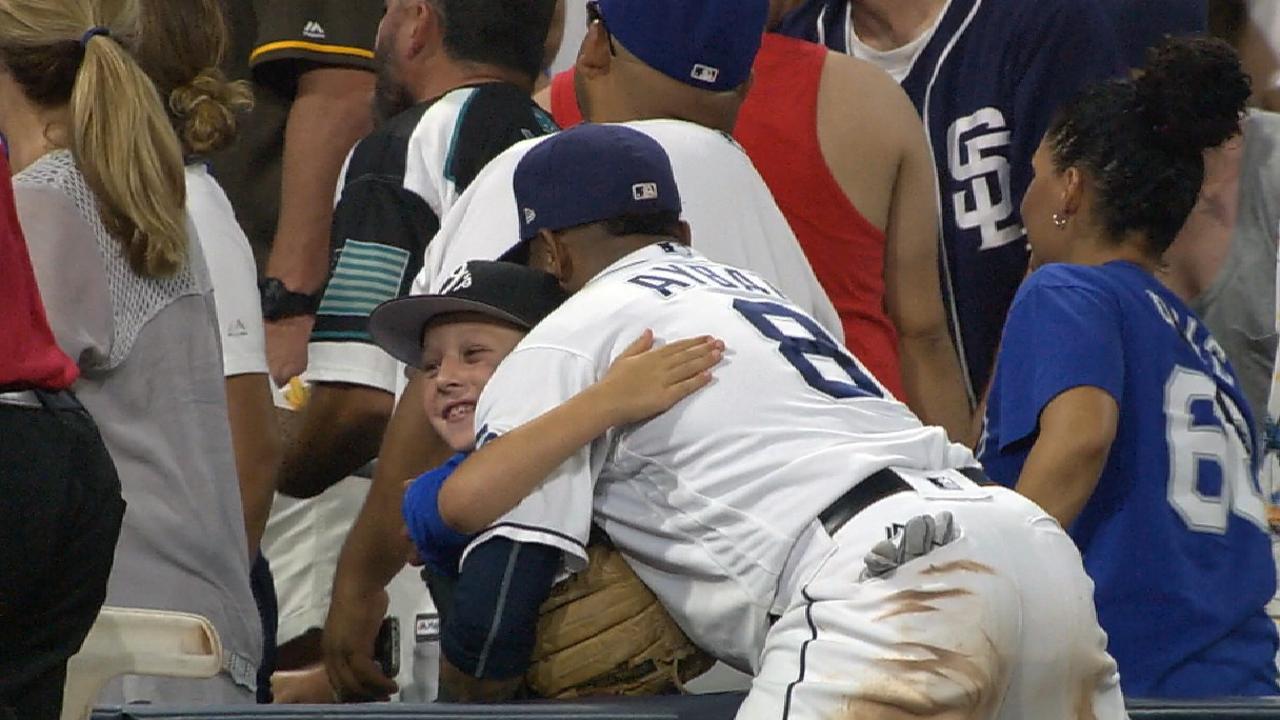 Aybar hugs a fan