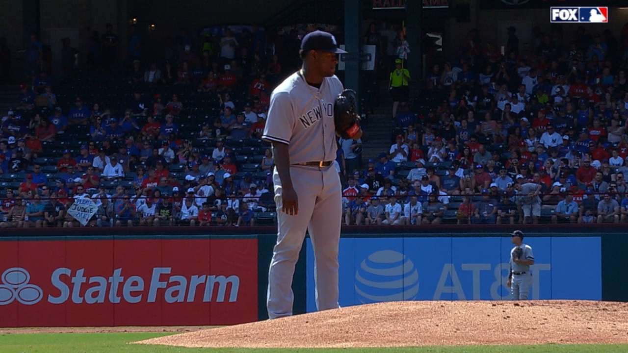 Yanks rally late, outlast Rangers in duel