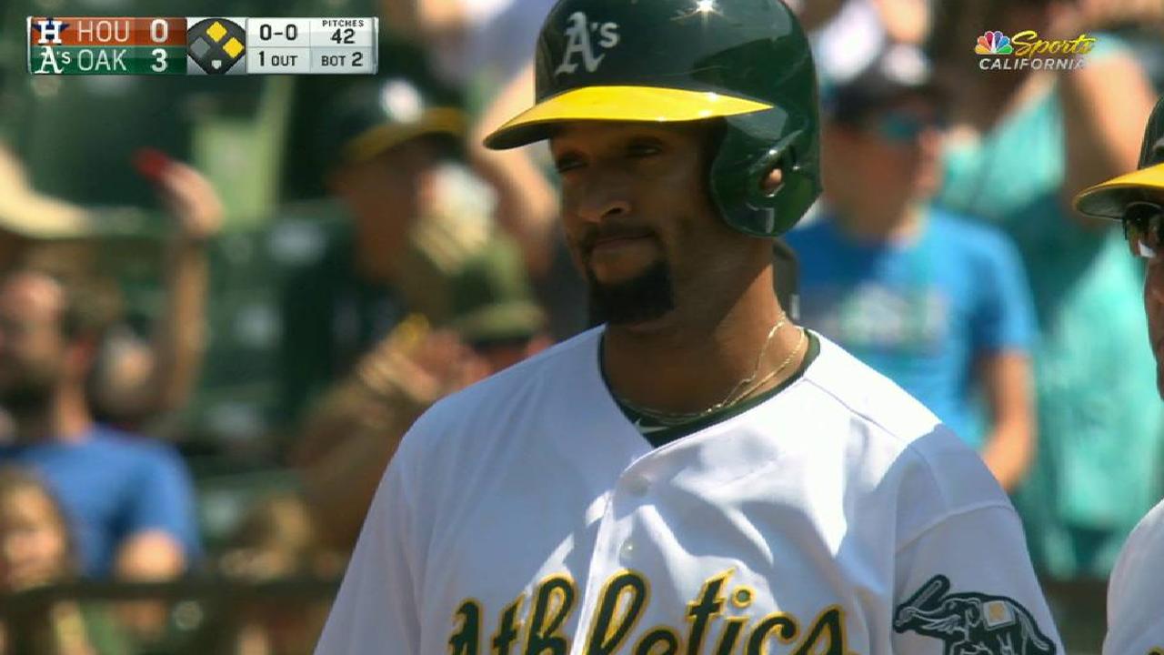 Powell beats the tag, pads lead