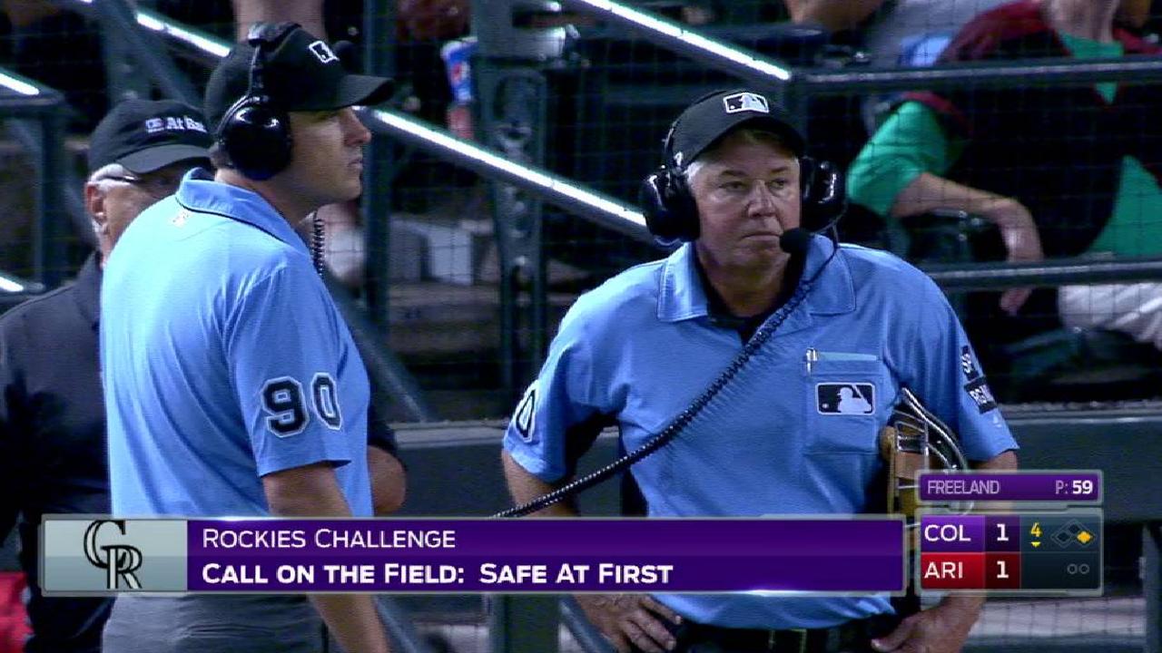 Martinez ruled safe at first