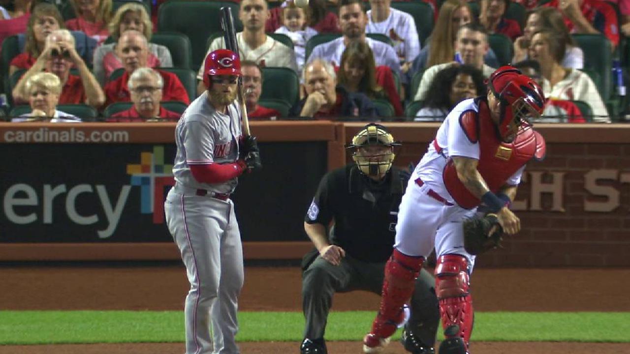 Cards slip in playoff chase with loss to Reds