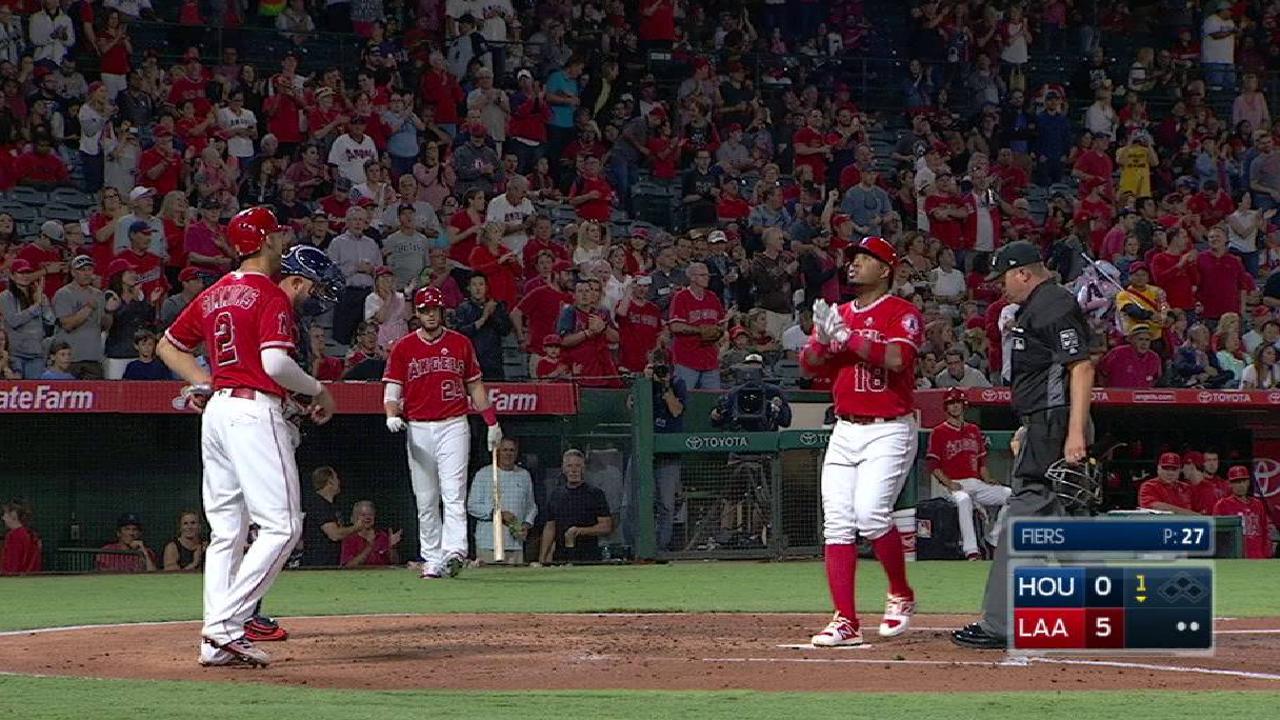 Halos roll past Astros, stay two back in WC