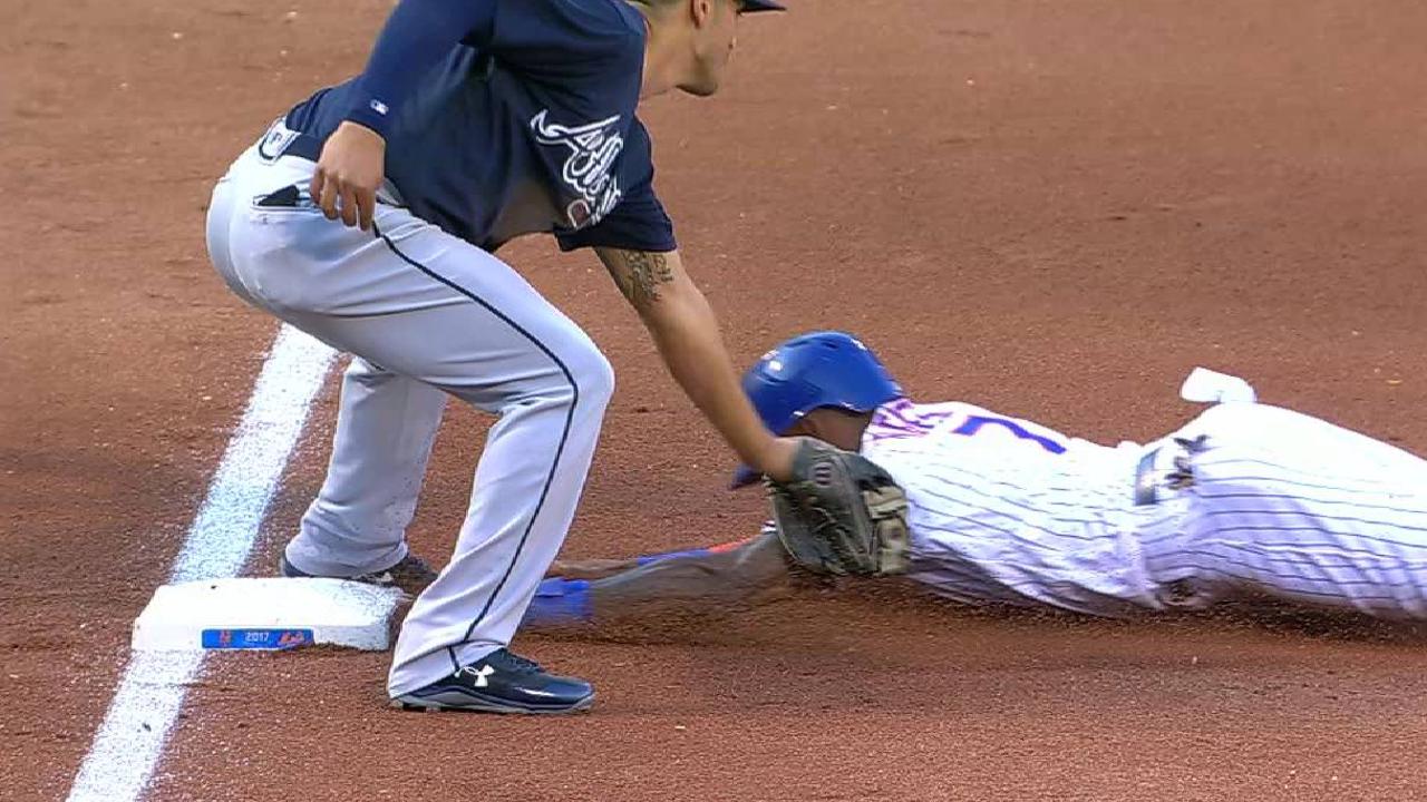 Flowers throws out Reyes