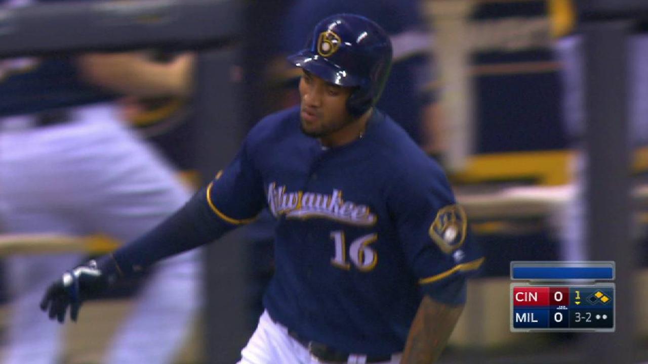 Crew holds off Reds' rally to keep pace in WC