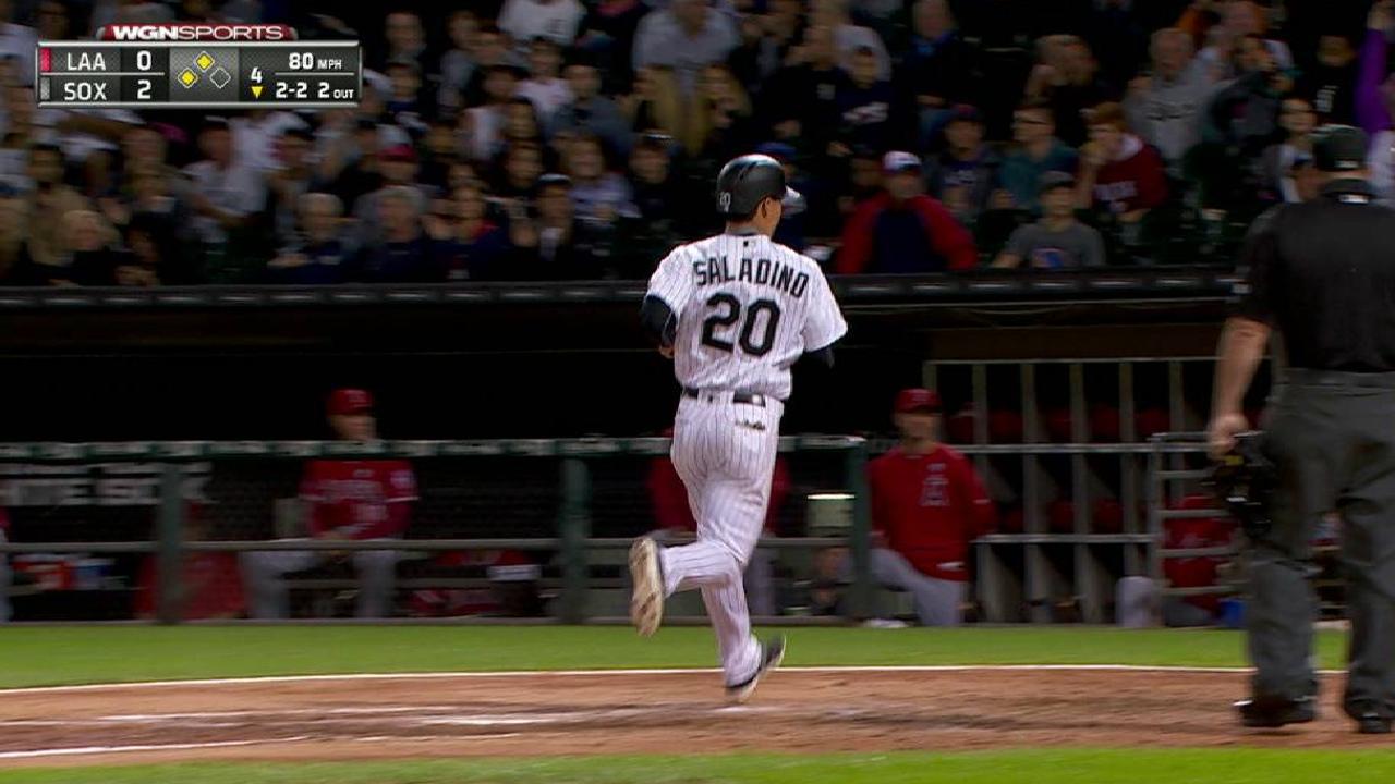Saladino scores on a wild pitch