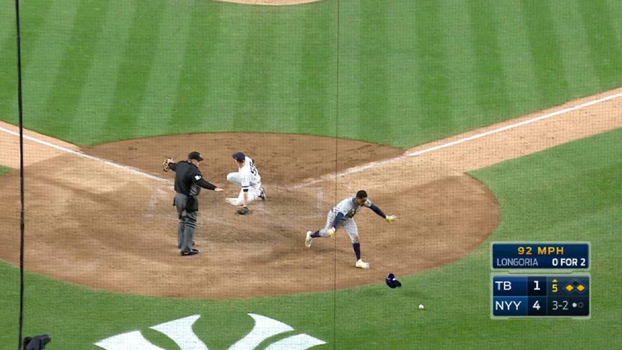 Smith scores on a wild pitch