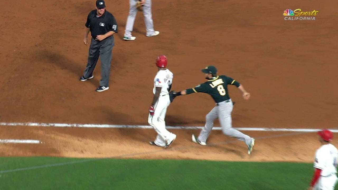 A's catch DeShields at first