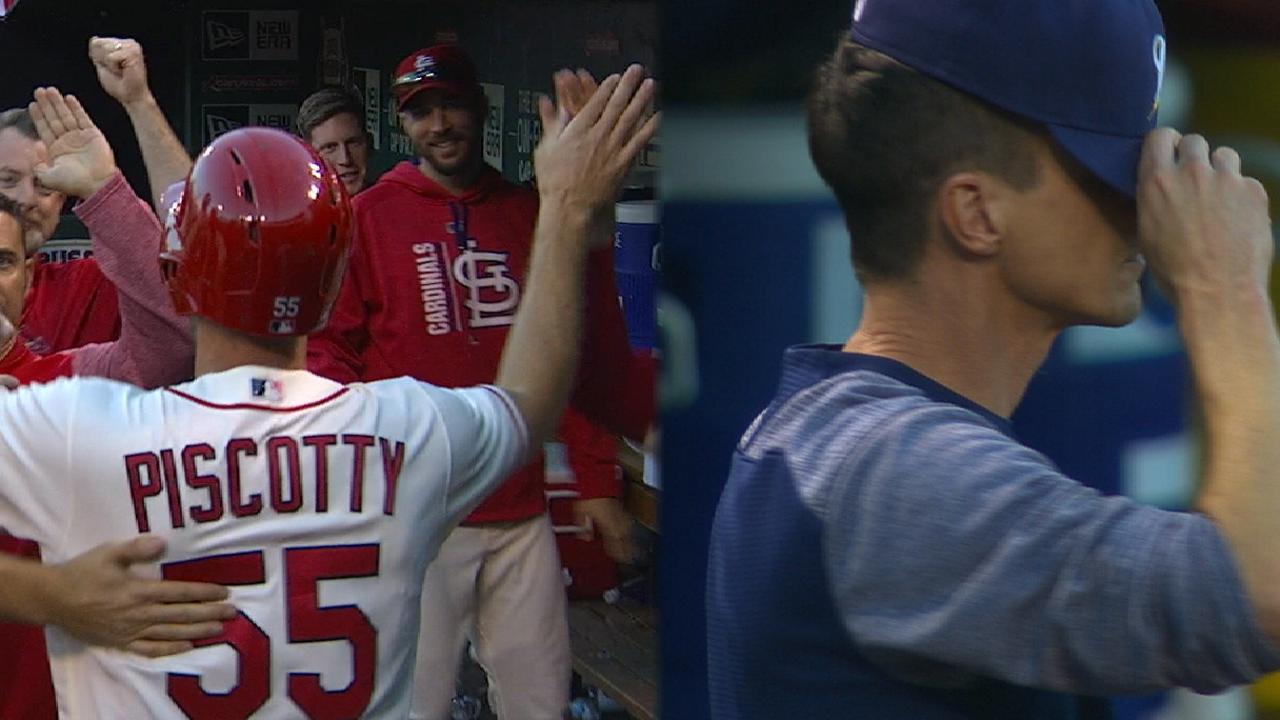 Cards rally from 6 down to eliminate Brewers