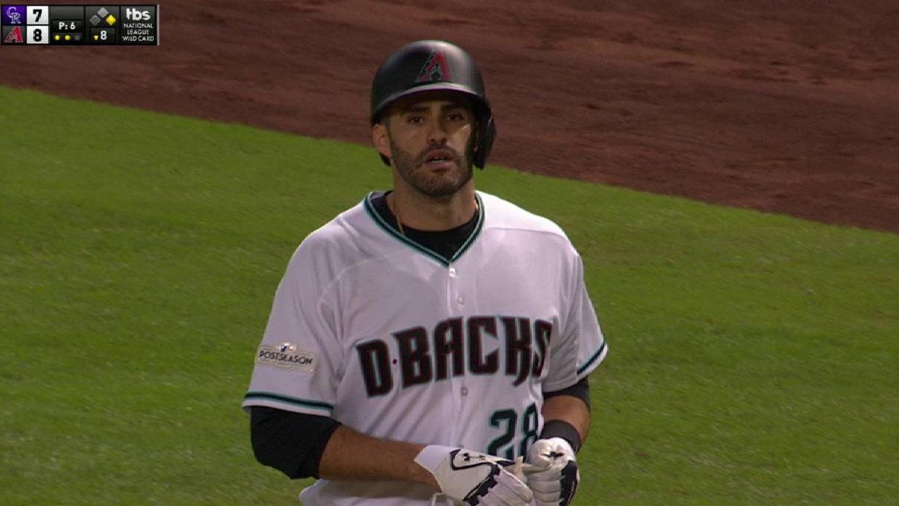 Martinez beats throw to first