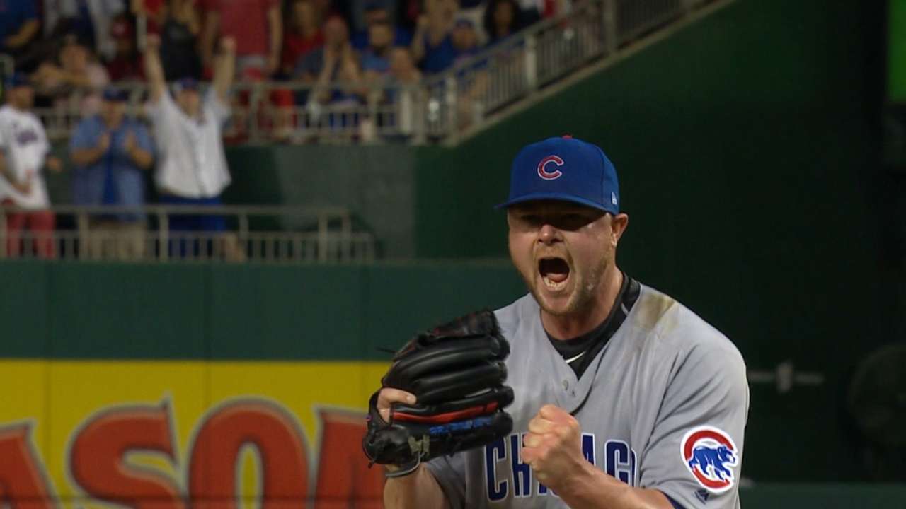 Lester escapes bases-loaded jam