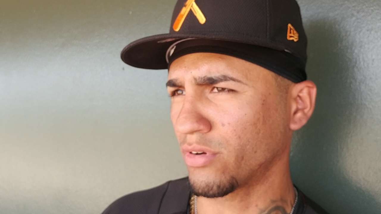 D-backs' Perez thrives at, behind plate in AFL opener