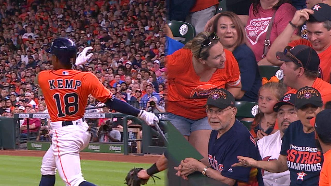 This Astros fan's reaction to her husband interfering on would-be