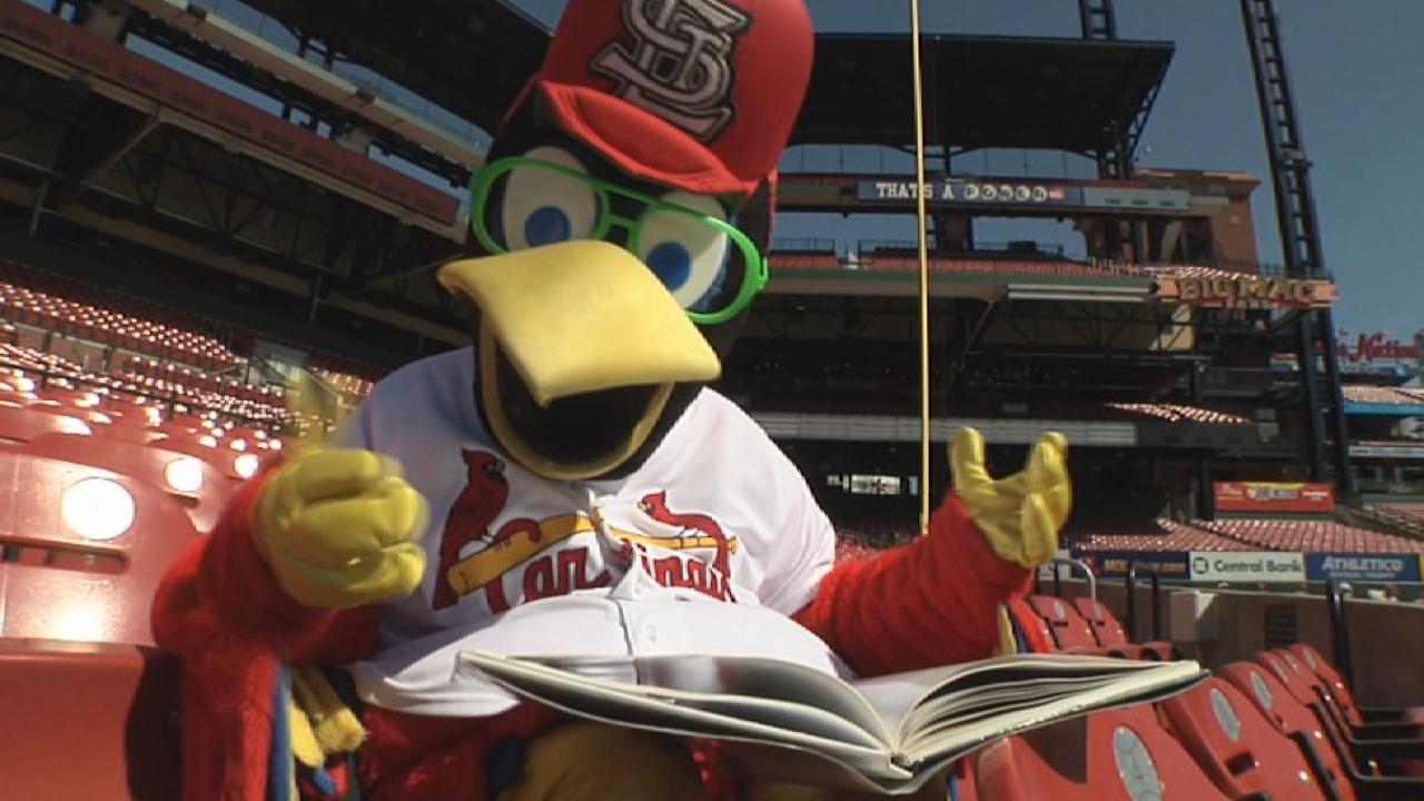 St. Louis Cardinals mascot Fredbird tips his cap as festivities