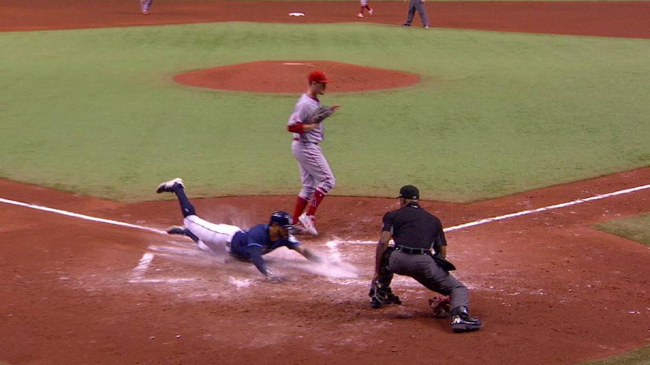 Pham scores on a wild pitch
